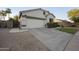 Well-kept home with a spacious driveway, two-car garage, and inviting curb appeal in a desirable neighborhood at 362 N Roger Way, Chandler, AZ 85225