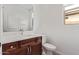 Clean bathroom featuring modern fixtures, single sink vanity, and neutral color palette at 39758 N Hailey Ln, Queen Creek, AZ 85140