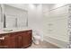 Bathroom features a combination shower and tub, single sink vanity, and tile floors at 39758 N Hailey Ln, Queen Creek, AZ 85140