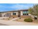Inviting single-story home with low maintenance desert landscaping and a two-car garage at 39758 N Hailey Ln, Queen Creek, AZ 85140