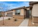 Inviting single-story home with a two-car garage and low maintenance desert landscaping at 39758 N Hailey Ln, Queen Creek, AZ 85140