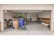 Spacious garage featuring ample storage, workbenches, and organization, perfect for hobbies or projects at 39758 N Hailey Ln, Queen Creek, AZ 85140