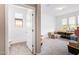 Large storage room with adjacent bathroom, carpet flooring and bright light at 39758 N Hailey Ln, Queen Creek, AZ 85140