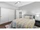 Bedroom features closet and wood floors, offering ample storage and style at 41105 N Prestancia Way, Anthem, AZ 85086