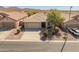 Charming single-story home featuring a xeriscaped front yard and neutral color palette at 41105 N Prestancia Way, Anthem, AZ 85086