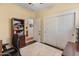 Bright office space with wood floors, storage cabinets, and a cozy rug at 41105 N Prestancia Way, Anthem, AZ 85086