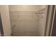 Walk-in closet includes plenty of adjustable shelving space for optimal organization at 5518 E Lindstrom Ln # 1034, Mesa, AZ 85215