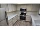 Updated kitchen features stainless steel appliances, countertops, and ample storage at 5518 E Lindstrom Ln # 1034, Mesa, AZ 85215