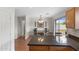 Bright eat-in kitchen dining area with a large sliding glass door to the backyard at 5819 S 10Th St, Phoenix, AZ 85040