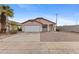 Charming single-story home featuring a two-car garage and low-maintenance desert landscaping at 5819 S 10Th St, Phoenix, AZ 85040