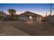 Inviting single-story home with a two-car garage and easy-care desert landscaping at 5819 S 10Th St, Phoenix, AZ 85040