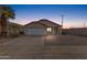 Charming single-story home featuring a two-car garage and low-maintenance desert landscaping at 5819 S 10Th St, Phoenix, AZ 85040