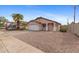 Inviting single-story home with a two-car garage and easy-care desert landscaping at 5819 S 10Th St, Phoenix, AZ 85040