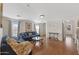 Spacious living room boasts natural light, wood floors, and cozy seating area at 5819 S 10Th St, Phoenix, AZ 85040