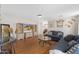 Cozy living room features modern decor, wood floors, and abundant natural light at 5819 S 10Th St, Phoenix, AZ 85040