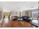 Bright and spacious living room with laminate wood floors and neutral decor at 5819 S 10Th St, Phoenix, AZ 85040