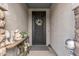 Inviting entryway with decorative door and stylish console table and décor at 5831 N 196Th Ln, Litchfield Park, AZ 85340