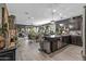 Open-concept kitchen featuring a large island and seamless flow to the living spaces at 5831 N 196Th Ln, Litchfield Park, AZ 85340