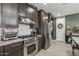 Well-appointed kitchen with stainless steel appliances and updated finishes at 5831 N 196Th Ln, Litchfield Park, AZ 85340