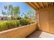 Balcony view with desert landscaping and flowering shrubs creating a private outdoor space at 5877 N Granite Reef Rd # 1145, Scottsdale, AZ 85250