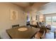 Charming dining area near the kitchen and living room, creating a welcoming and functional living space at 5877 N Granite Reef Rd # 1145, Scottsdale, AZ 85250