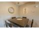 Cozy dining area features a wooden table, comfortable seating, and elegant wall decor at 5877 N Granite Reef Rd # 1145, Scottsdale, AZ 85250
