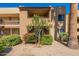 Attractive exterior view showcases the building's architecture, balcony, and lush landscaping at 5877 N Granite Reef Rd # 1145, Scottsdale, AZ 85250