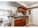 The kitchen features a bar, cabinets, granite countertops, and stainless steel appliances at 5877 N Granite Reef Rd # 1145, Scottsdale, AZ 85250