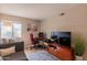 Comfortable living room features stylish furniture, decor, and a large tv at 5877 N Granite Reef Rd # 1145, Scottsdale, AZ 85250
