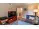 Comfortable living room features stylish furniture, decor, and easy access to the kitchen at 5877 N Granite Reef Rd # 1145, Scottsdale, AZ 85250