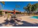 Relaxing poolside retreat with patio furniture, lounge chairs and umbrellas, perfect for outdoor relaxation and entertaining at 5877 N Granite Reef Rd # 1145, Scottsdale, AZ 85250