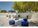 Outdoor backyard seating area featuring a fire pit and additional lounge furniture at 6326 N 86Th N St, Scottsdale, AZ 85250