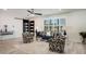 Bright living room with modern furniture, a decorative ceiling fan, and white wood-look flooring at 6326 N 86Th N St, Scottsdale, AZ 85250