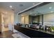 Modern bathroom with double sinks, sleek countertops, and a contemporary mirror at 7278 E Echo Ln, Scottsdale, AZ 85258