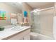 Bathroom featuring shower over tub, vanity, modern fixtures, and framed art at 7312 N Via Camello Del Norte St # 95, Scottsdale, AZ 85258