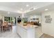 Open-concept living space with modern tile flooring, abundant natural light, and sliding glass doors to the backyard at 7312 N Via Camello Del Norte St # 95, Scottsdale, AZ 85258