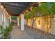 Charming backyard walkway features stone, pebbles, and night-time lighting, perfect for evening strolls at 8001 N 3Rd Pl, Phoenix, AZ 85020