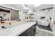 A luxurious bathroom with double sinks, a soaking tub, a glass shower, and stylish finishes at 8001 N 3Rd Pl, Phoenix, AZ 85020