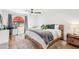 Bedroom with a cozy rug, a rustic wood bedframe and lots of natural light at 8001 N 3Rd Pl, Phoenix, AZ 85020
