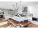 Bright, modern kitchen with a large island, stainless steel appliances, and stylish pendant lighting at 8001 N 3Rd Pl, Phoenix, AZ 85020