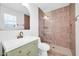 Updated bathroom featuring modern fixtures, beautiful tiling, and a glass-enclosed shower at 905 E Marco Polo Rd, Phoenix, AZ 85024