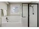 Bright bathroom featuring a tub, separate shower, and neutral finishes at 9743 E Torino Ave, Mesa, AZ 85212