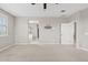 A spacious bedroom with neutral walls and plush carpet at 9743 E Torino Ave, Mesa, AZ 85212
