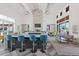 Spacious clubhouse with modern design, large island, ample seating, and stylish decor at 9743 E Torino Ave, Mesa, AZ 85212