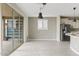 Inviting dining area featuring a sliding glass door to the patio and views of the kitchen at 9743 E Torino Ave, Mesa, AZ 85212