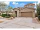 Well-maintained two-story home featuring manicured landscaping and a spacious two-car garage at 9743 E Torino Ave, Mesa, AZ 85212