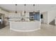 Modern kitchen featuring an island, stainless steel appliances, and ample cabinet space for storage at 9743 E Torino Ave, Mesa, AZ 85212