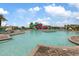 Inviting community pool with a colorful waterslide, lounge chairs, and clear blue water at 9743 E Torino Ave, Mesa, AZ 85212