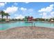 Resort-style community pool area featuring multiple water slides and comfortable lounge chairs at 9743 E Torino Ave, Mesa, AZ 85212