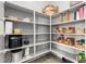 Spacious pantry featuring ample shelving, providing plenty of storage space for food and kitchen essentials at 1225 N 36Th St # 2101, Phoenix, AZ 85008